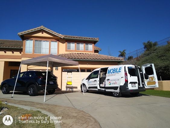 Truetints  by Gary, Mobile Automotive Window Tinting Service of San Diego County on location at a customers home tinting customers vehicle.